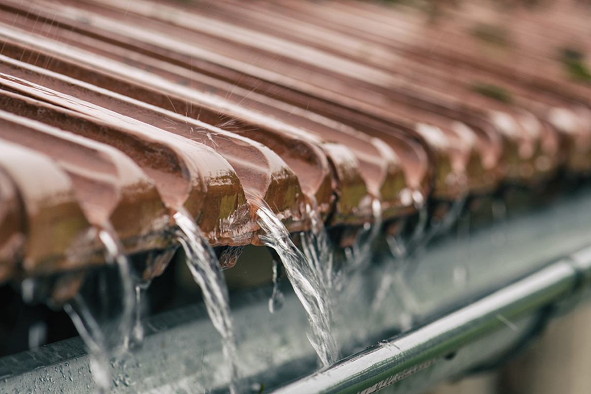why gutters overflow in heavy rain